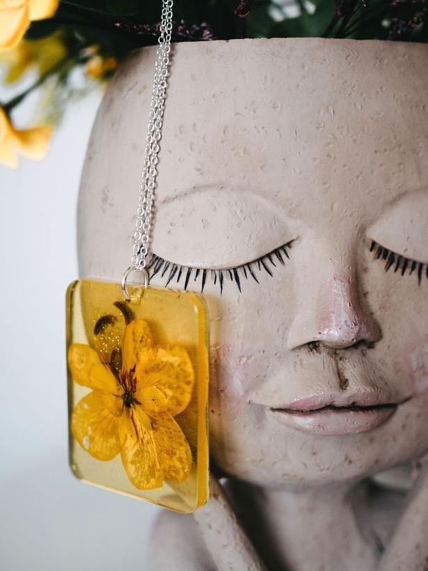 Yellow flower resin pendant